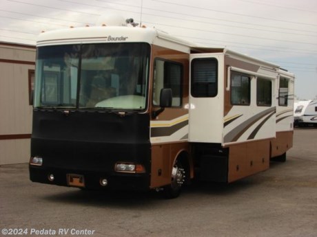 &lt;p&gt;&amp;nbsp;&lt;/p&gt;

&lt;p&gt;This 2004 Fleetwood Bounder is a very nice diesel pusher with low miles and some very nice extras.&amp;nbsp; Features include: fully automatic leveling jacks, power visors, power patio awning, thermal-pane windows, TV, DVD, VCR, satellite dish, large glass shower, solid surface counter tops, large four door refrigerator with ice maker, convection microwave oven, pull-out pantry, fantastic fan, and a built-in washer/dryer. For complete information call us toll free at 888-545-8314.&lt;/p&gt;
