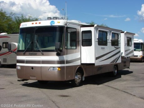 &lt;p&gt;
	This 2003 Holiday Rambler Neptune is a beautiful diesel pusher that is loaded with some nice features and priced to move VERY fast.&amp;nbsp; Features include: power visors, exhaust brakes, back-up camera, thermal pane windows, fantastic fan, leveling jacks, day-night shades, convection microwave oven, pull-out pantry, solid surface counter tops, glass shower, recliner, TV, VCR, power inverter, encased patio awning, and encased window awnings. For complete information call us toll free at 888-545-8314.&lt;/p&gt;
