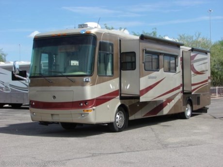 &lt;p&gt;This 2006 Holiday Rambler Ambassador is a beautiful diesel pusher with some great features that make it a wonderful way to travel.&amp;nbsp; Features include: solid surface counter tops, convection microwave oven, large four door refrigerator with ice, kitchen skylight, ultra leather, exterior entertainment center, computer desk, rear lounge, power patio awning, satellite radio, LCD TV, DVD, VCR, 5.1 surround sound, satellite dish, fully automatic leveling jacks, power visors, exhaust brake, cruise control, three way back-up camera, and RV Sani-con. For complete information call us toll free at 888-545-8314.&lt;/p&gt;
