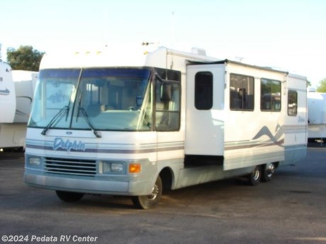 &lt;p&gt;This 1996 National Dolphin is a very nice class A with a slide for an amazing low price.&amp;nbsp; Features include: leveling jacks, day-night shades, TV, DVD, CD, stereo, back-up camera, solid surface counter tops, convection microwave oven, refrigerator, stove, built-in coffee maker, wrap around kitchen, and power patio owning. For complete information call us toll free at 888-545-8314.&lt;/p&gt;
