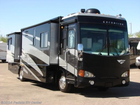 &lt;p&gt;This 2006 Fleetwood Excursion is a beautiful class A diesel pusher with four slides, plenty of room and ready to travel in style.&amp;nbsp; Features include: exterior entertainment center, power patio awning, encased window awning, automatic leveling jacks, power inverter, automatic generator start, reclining sofa, TV, DVD, VCR, satellite radio, fantastic fan, convection microwave oven, central vacuum, built-in washer/dryer, large four door refrigerator with ice maker, power visors, and a back-up camera. &amp;nbsp;For complete information call us toll free at 888-545-8314.&lt;/p&gt;
