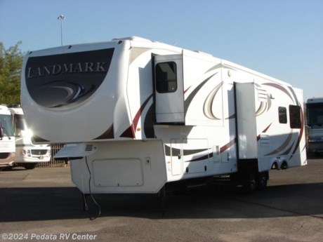 &lt;p&gt;This 2011 Heartland Landmark is a beautiful fifth wheel that is loaded with every option.&amp;nbsp; Features include: solid surface counter tops, large four door refrigerator, island sink, large pantry, lots of storage, central vacuum, fire place, TV, DVD, 5.1 surround sound, iPod connect, power patio awning, fully automatic leveling jacks, fantastic fan, recessed lighting, ceiling fan, ceiling fan, and keyless entry. For complete information call us toll free at 888-545-8314.&lt;/p&gt;

