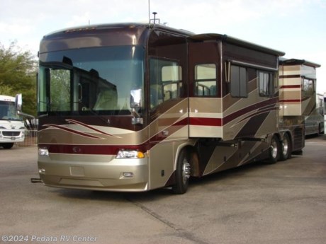 &lt;p&gt;This 2006 Country Coach Allure is a exactly what you would expect from a Country Coach, loaded with all the luxury and quality that you could ask for.&amp;nbsp; Features include: Hydro Hot, full pass through storage tray, solid wood throughout, large HD TV, VCR, satellite dish, 5.1 surround sound, large glass shower, fantastic fan with rain sensor, air leveling, encased window awnings, smart wheel, adjustable pedals, power visors, fully adjustable driver and co-captain chairs with heat and massage, satellite radio, navigation system, large four door refrigerator with ice, marble floors, and a convection microwave oven. For complete information call us toll free at 888-545-8314.&lt;/p&gt;
