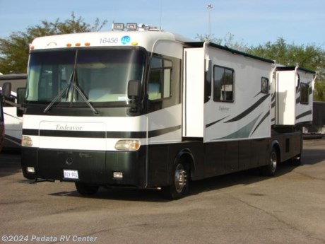 &lt;p&gt;&amp;nbsp;&lt;/p&gt;

&lt;p&gt;This 2001 Holiday Rambler Endeavor is a very nice diesel pusher with all the extras to be sure that you are traveling in comfort.&amp;nbsp; Features include: adjustable pedals, air horn, encased patio awning, glass shower, ceramic tile floors, TV, DVD, VCR, satellite dish, built-in washer/dryer, solid surface counter tops, large four door refrigerator with ice, convection microwave oven, built-in coffee maker, stove and oven. For complete information call us toll free at 888-545-8314.&lt;/p&gt;
