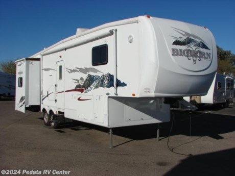 &lt;p&gt;&amp;nbsp;&lt;/p&gt;

&lt;p&gt;&amp;nbsp;&lt;/p&gt;

&lt;p&gt;This 2006 Heartland Bighorn is a very nice fifth wheel with lots of extras to make your home away from home cozy.&amp;nbsp; Features include: day-night shades, king bed, large glass shower, fantastic fan with rain sensor, solid surface counter tops, microwave, stove, oven, ceiling fan, TV, DVD, surround sound, and a built in computer desk. For complete information call us toll free at 888-545-8314.&lt;/p&gt;
