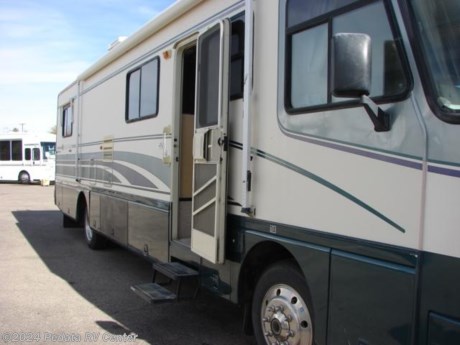 &lt;p&gt;Here&#39;s your opportunity to own a Diesel Pusher for the price of a Class C Motorhome! This unit has been well cared for and shows like one with lots less miles. With features like washer/dryer, satellite dish, leveling jacks, back-up camera, Alcoa rims&amp;nbsp;etc. It&#39;s hard to believe the price. A must see before it&#39;s too late. Call 1-866-733-2829 for more details.&lt;/p&gt;
