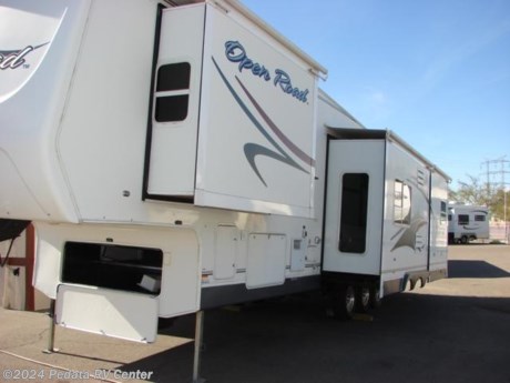 &lt;p&gt;This a&amp;nbsp;STEAL for a 40ft Quad Slide Fifth Wheel! Fully loaded with stacked Washer/Dryer, Central Vac, Ceiling fan, etc. This unit even has a Fireplace! If you have Champagne taste but a beer budget you better hurry before it&#39;s gone! Call 1-866-733-2829 for details on how to make this one yours!&lt;/p&gt;
