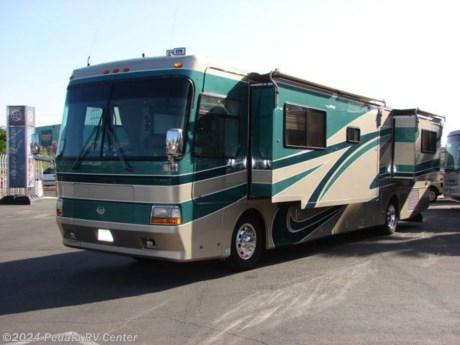 &lt;p&gt;This 2001 Monaco Windsor 40PBD is appointed with everything that you would expect in a luxury coach. Features include solid wood natural cherry cabinetry throughout, J lounge, built in desk, Corian counters throughout, convection microwave oven, aluminum wheels, Smartwheel, satellite dish, and the energy management system. For complete information call us toll free at 888-545-8314.&lt;/p&gt;
