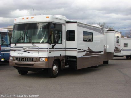 &lt;p&gt;This 2005 Winnebago Voyage features a very poplar floor plan featuring a mid-coach entertainment center. Other features include convection microwave oven, Solid surface counter tops, day-night shades, thermal pane windows, satellite dish, DVD, VCR, five-point surround sound, large shower, and a driver&#39;s door. For complete information call us toll free at 888-545-8314.&lt;/p&gt;
