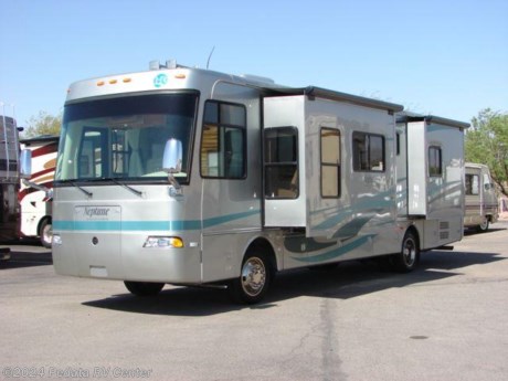 &lt;p&gt;This 2006 Holiday Rambler Neptune is loaded with some great features and all at an amazing price. Features include convection microwave oven, solid surface counter tops, large refrigerator with an ice maker, day-night shades, thermal pane windows, three-camera rear vision system, TV, five point surround sound system, satellite radio, power awning, and a very spacious floor plan with four slides. For complete information call us toll free at 888-545-8314.&lt;/p&gt;
