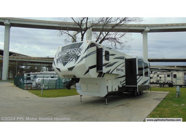 2013 Keystone Raptor 381LEV - Used Fifth Wheel For Sale by PPL Motor Homes in Houston, Texas features Stove, Refrigerator, TV, Microwave, Air Conditioning