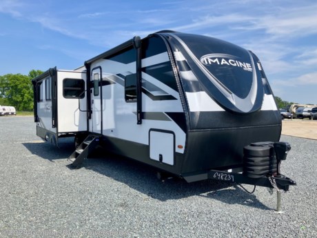 &lt;p&gt;&lt;span style=&quot;font-size: 16px;&quot;&gt;&lt;strong&gt;2024 Grand Design Imagine 2970RL Travel Trailer...&lt;/strong&gt;&lt;/span&gt;&lt;/p&gt;
&lt;p&gt;&lt;em&gt;Rear Living, Queen Bed, Solar Package...&lt;/em&gt;&lt;/p&gt;
&lt;p&gt;&lt;em&gt;&lt;strong&gt;Features Include...&lt;/strong&gt;&lt;/em&gt;&lt;/p&gt;
&lt;ul&gt;
&lt;li&gt;Peace of Mind Package&lt;/li&gt;
&lt;li&gt;Ultimate Power Package&lt;/li&gt;
&lt;li&gt;Arctic 4-Seasons Protection Package&lt;/li&gt;
&lt;li&gt;Solar Package&lt;/li&gt;
&lt;li&gt;Goodyear Tires w/ 15&quot; Aluminum Wheels&lt;/li&gt;
&lt;li&gt;SafeRide&amp;nbsp;RV Roadside Assistance&lt;/li&gt;
&lt;li&gt;Electric Fireplace&lt;/li&gt;
&lt;li&gt;Theater Seating&lt;/li&gt;
&lt;li&gt;15,000&amp;nbsp;btu&amp;nbsp;Ducted Air Conditioner&lt;/li&gt;
&lt;li&gt;13,500&amp;nbsp;btu&amp;nbsp;Ducted Air Conditioner&lt;/li&gt;
&lt;li&gt;Booth Dinette&lt;/li&gt;
&lt;li&gt;Two (2) Power Patio Awnings - 10&#39; &amp;amp; 11&#39;&lt;/li&gt;
&lt;li&gt;10 cf 12v/DC Refrigerator/Freezer&lt;/li&gt;
&lt;li&gt;40&quot; LED Television&lt;/li&gt;
&lt;li&gt;ABS Axle Assembly&lt;/li&gt;
&lt;/ul&gt;
&lt;p&gt;&lt;span style=&quot;font-style: italic; font-weight: bold;&quot;&gt;Our Sale Price Includes: Pre-Delivery Inspection, RV/Marine Battery, Propane Bottles Filled, Walk Thru&amp;nbsp;Orientation &amp;amp; Factory Freight Charges...&lt;/span&gt;&lt;/p&gt;