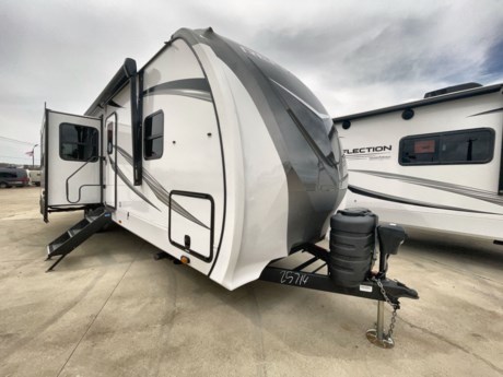 &lt;p&gt;Finding the perfect trailer for a larger group is simple, take a look at this one for your next RV! The rear bunkhouse might be the first reason you fall in love because of the slide out with a flip bunk above a tri-fold sofa, the second bunk bed on the opposite side and storage below, and the large rear window for great views. The outside kitchen might be another reason allowing you to enjoy the outdoors while providing meals for everyone, and/or the inside gourmet kitchen with a 16 cu. ft. refrigerator, an island, and two hutches. Everyone can gather together and relax on the theatre seating with cupholders and the booth dinette or choose a free standing dinette option, and to visit or watch the 40&quot; LED HDTV with fireplace below. The full bathroom includes a space savings sliding door and linen storage, and the bedroom gives you a front walk-around queen bed with storage for your clothes on each side, plus there is an additional wardrobe with drawers and the option to add a washer/dryer to the prepped space.&lt;/p&gt;
&lt;p&gt;&amp;nbsp;&lt;/p&gt;
&lt;p&gt;With any Reflection travel trailer by Grand Design, you will have a solar panel for off-grid camping and a 50 amp charge controller and inverter prep, a Universal All-In-One Docking Station, unobstructed pass-through storage, and nitrogen filled radial tires. Some other top features include the 30&quot; stainless steel microwave, the maximum 7-foot headroom, and the ductless heating system with no vents in the floor to collect debris. Each is constructed of gel coat exterior sidewalls, residential 5&quot; truss rafters, walk-on roof decking, a fiberglass and radiant foil roof and front cap insulation plus laminated aluminum framed side walls, roof and end walls in slide rooms. Choose luxury, value, and towability over all the others, take home a Reflection of your good taste!&lt;/p&gt;