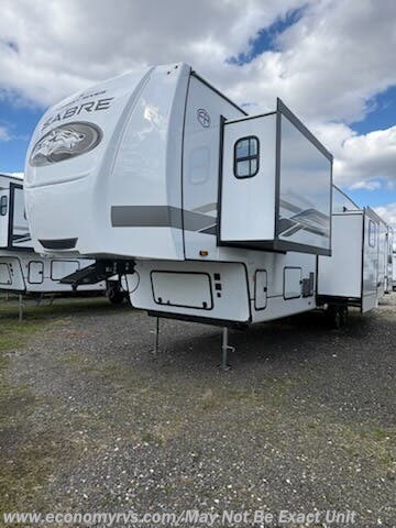 2026 Forest River Sabre 36FLX - New Fifth Wheel For Sale by Economy RVS, LLC in Mechanicsville, Maryland features Ceiling Fan, Skylight, Microwave, TV, Spare Tire Kit