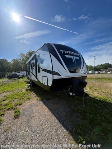2023 Heartland Torque P26 - Used Toy Hauler For Sale by Economy RVS, LLC in Mechanicsville, Maryland features Microwave, Screen Door, Slideout, Stove Top Burner, Generator