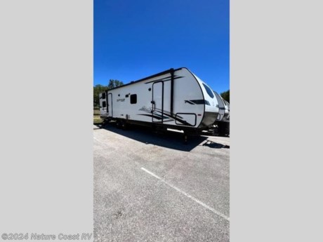&lt;p&gt;&lt;strong&gt;Forest River Surveyor Legend travel trailer 296QBLE highlights:&lt;/strong&gt;&lt;/p&gt;
&lt;ul&gt;
&lt;li&gt;2 Air Conditioners&amp;nbsp; 15,000/13,500 BTU w/50 Amp Service&lt;/li&gt;
&lt;li&gt;Dual Entry Doors&lt;/li&gt;
&lt;li&gt;Outside Kitchen&lt;/li&gt;
&lt;li&gt;Large Slide Out&lt;/li&gt;
&lt;li&gt;Walk-Through Bath&lt;/li&gt;
&lt;li&gt;Pass-through Storage&lt;/li&gt;
&lt;li&gt;Private Bunkhouse&lt;/li&gt;
&lt;/ul&gt;
&lt;p&gt;&amp;nbsp;&lt;/p&gt;
&lt;p&gt;This spacious travel trailer is perfect for those who need plenty of sleeping space! There are &lt;strong&gt;four bunks&lt;/strong&gt; in the bunkhouse for little ones or your friends, and the front master bedroom will feel just like home with its &lt;strong&gt;queen-size bed&lt;/strong&gt; and dual drawers. You&#39;ll find a sofa and &lt;strong&gt;U-shaped dinette&lt;/strong&gt; within the large slide in the main living area, and there is a &lt;strong&gt;walk-in pantry&lt;/strong&gt; to store food, jackets, or umbrellas. Don&#39;t overlook the exterior that includes an outside kitchen, a 21&#39; one touch electric awning, and outside storage!&lt;/p&gt;
&lt;p&gt;&amp;nbsp;&lt;/p&gt;
&lt;p&gt;With any Surveyor Legend travel trailer by Forest River you will enjoy quality craftsmanship, convenient amenities, and at-home comforts. The &lt;strong&gt;Azdel composite panels&lt;/strong&gt; provide a longer-lasting trailer, and the Lippert axles &lt;strong&gt;leaf spring suspension&lt;/strong&gt; will make towing easier than ever. You will enjoy many interior comforts, such as modern frame edge cabinets, designer Shaw lino flooring, an Indura-Kleen Evergreen mattress, and &lt;strong&gt;EZ-access dinette storage&lt;/strong&gt; to bring along board games, flashlights, and throw blankets. The magnetic baggage door catches allow you to easily pack up your gear, and the friction hinge entry door(s) will make coming and going smooth as ever. Each model includes a 30K BTU ducted furnace, or a 20K BTU furnace in the Sub-4&#39;s, a &lt;strong&gt;15K high performance A/C&lt;/strong&gt;, plus a fully enclosed and heated underbelly to keep you comfortable through spring, summer, fall, or winter!&lt;/p&gt;
&lt;ul&gt;
&lt;li&gt;U Shaped Dinette&lt;/li&gt;
&lt;li&gt;Two Entry/Exit Doors&lt;/li&gt;
&lt;li&gt;Front Bedroom&lt;/li&gt;
&lt;li&gt;Walk-Thru Bath&lt;/li&gt;
&lt;li&gt;Outdoor Kitchen&lt;/li&gt;
&lt;li&gt;Bunkhouse&lt;/li&gt;
&lt;/ul&gt;