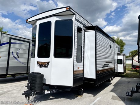 &lt;p&gt;This is a beautiful destination trailer with 2 lofts for extra sleeping space.&amp;nbsp; The interior is done in the Capri Decor.&amp;nbsp;&amp;nbsp;&lt;/p&gt;
&lt;p&gt;Some of the standard features on this Grand Lodge are:&lt;/p&gt;
&lt;p&gt;*Taller Ceilings&amp;nbsp; &amp;nbsp; &amp;nbsp; &amp;nbsp; &amp;nbsp; &amp;nbsp; &amp;nbsp; &amp;nbsp; *5&quot; HDTV in Living Room&amp;nbsp; &amp;nbsp; &amp;nbsp; &amp;nbsp; &amp;nbsp; *Dual USB Ports in Bedroom&lt;/p&gt;
&lt;p&gt;*2nd A/C&amp;nbsp; &amp;nbsp; &amp;nbsp; &amp;nbsp; &amp;nbsp; &amp;nbsp; &amp;nbsp; &amp;nbsp; &amp;nbsp; &amp;nbsp; &amp;nbsp; &amp;nbsp; &amp;nbsp;*20 Gallon Elec. Water Heater&amp;nbsp; &amp;nbsp;*Black Frame Tinted Windows&lt;/p&gt;
&lt;p&gt;*Seamless Countertops&amp;nbsp; &amp;nbsp;*Black Tank Flush&amp;nbsp; &amp;nbsp; &amp;nbsp; &amp;nbsp; &amp;nbsp; &amp;nbsp; &amp;nbsp; &amp;nbsp; &amp;nbsp; &amp;nbsp; &amp;nbsp;&amp;nbsp;&lt;/p&gt;
&lt;p&gt;*Fireplace - w/Mirror Front&lt;/p&gt;
&lt;p&gt;Plus the Best in Class Value Package:&lt;/p&gt;
&lt;p&gt;*Versa Tilt Bed&amp;nbsp; *Upgraded Designer Furniture&amp;nbsp; *Exterior LED Light Strip under Awning&lt;/p&gt;
&lt;p&gt;*Heated and Enclosed Underbelly with Removable Panels&lt;/p&gt;
&lt;p&gt;*Central Vacuum w/ Sweep Attachment&amp;nbsp; *Seamless Countertops&amp;nbsp;&amp;nbsp;&lt;/p&gt;
&lt;p&gt;&amp;nbsp;&lt;/p&gt;