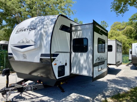 &lt;p&gt;This is a charming floorplan - from the &lt;strong&gt;rear kitchen &lt;/strong&gt;with a fantastic view and plenty of &lt;strong&gt;counter space&lt;/strong&gt;, to the open and comfortable living room with &lt;strong&gt;plenty of seating&lt;/strong&gt;, this travel trailer screams comfort.&amp;nbsp;&amp;nbsp;&lt;/p&gt;
&lt;p&gt;The &lt;strong&gt;master suite &lt;/strong&gt;has a &lt;strong&gt;slide &lt;/strong&gt;with a &lt;strong&gt;full closet&lt;/strong&gt; and &lt;strong&gt;w/d hookups&lt;/strong&gt;.&amp;nbsp; An inviting area to get a good nights rest.&amp;nbsp;&amp;nbsp;&lt;/p&gt;
&lt;p&gt;The following are some of the features and options on the Grand Surveyor:&lt;/p&gt;
&lt;ul&gt;
&lt;li&gt;Wineguard Air 360&lt;/li&gt;
&lt;li&gt;2 A/C&#39;s&lt;/li&gt;
&lt;li&gt;Solar&lt;/li&gt;
&lt;li&gt;Power Awning, Speakers, LED Lights&lt;/li&gt;
&lt;li&gt;Azdel on board&lt;/li&gt;
&lt;li&gt;Goodyear Tires&lt;/li&gt;
&lt;li&gt;Extended Season Ready&lt;/li&gt;
&lt;li&gt;W/D Prep&lt;/li&gt;
&lt;li&gt;Tire Pressure Monitoring System&lt;/li&gt;
&lt;li&gt;Spare Tire&lt;/li&gt;
&lt;li&gt;50 AMP Service&lt;/li&gt;
&lt;li&gt;Black Tank Flush&lt;/li&gt;
&lt;li&gt;On Demand Tankless Water Heater&lt;/li&gt;
&lt;li&gt;Outdoor Camp Kitchen&lt;/li&gt;
&lt;li&gt;Battery Disconnect&lt;/li&gt;
&lt;li&gt;Power Tongue Jack&lt;/li&gt;
&lt;li&gt;Central Vac System&lt;/li&gt;
&lt;li&gt;2&quot; Rear Accessory Hitch&lt;/li&gt;
&lt;li&gt;Power Stabalizing Jacks&lt;/li&gt;
&lt;/ul&gt;
&lt;p&gt;Grand Surveyors are built with Superior Construction with a Superior Aluminum Structure and a Fully Walkable Roof.&amp;nbsp;&amp;nbsp;&lt;/p&gt;
&lt;p&gt;&amp;nbsp;&lt;/p&gt;