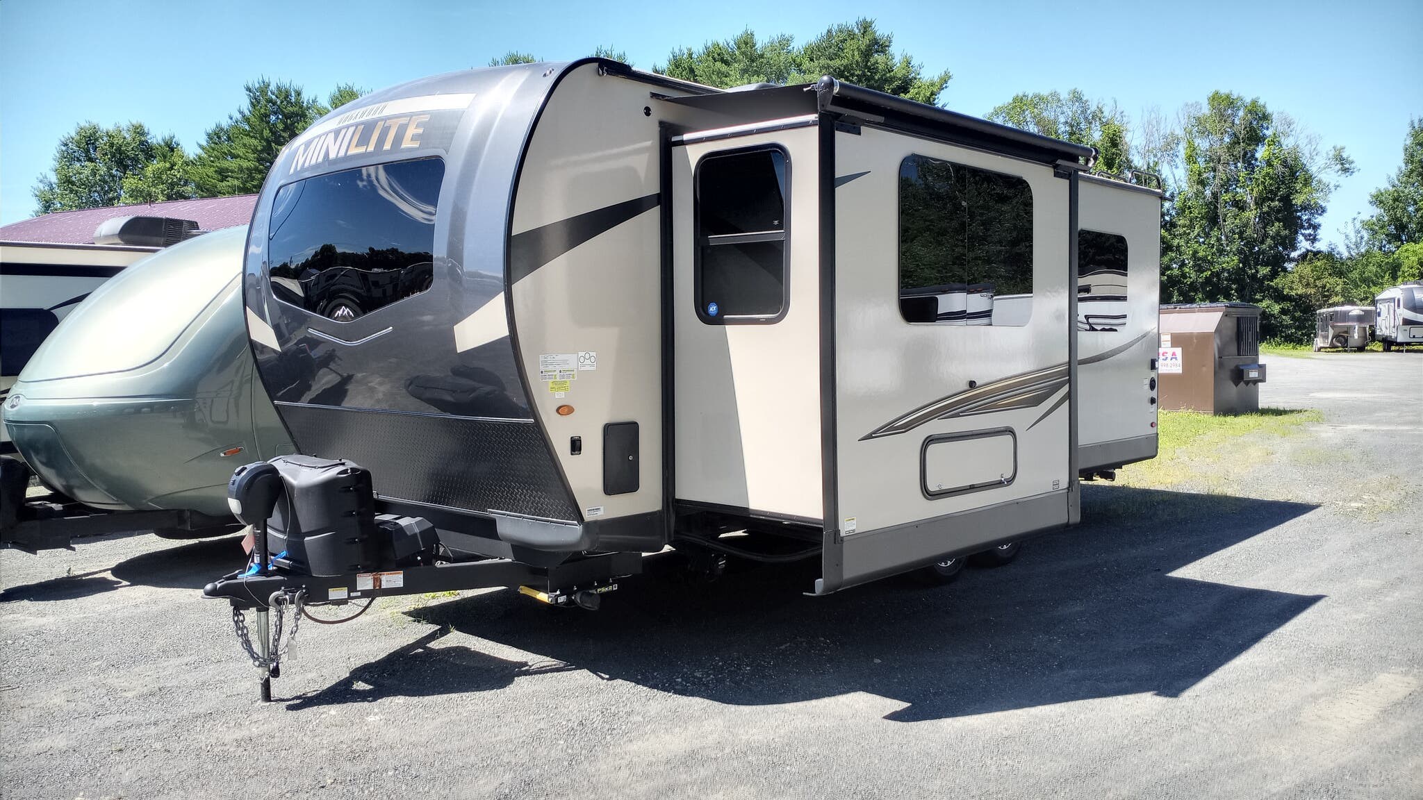 2022 Forest River Rockwood Mini Lite 2506S - Used Travel Trailer For Sale by Orchard Trailers, Inc. in Whately, Massachusetts features CO Detector, Ladder, Skylight, Auxiliary Battery, Queen Bed