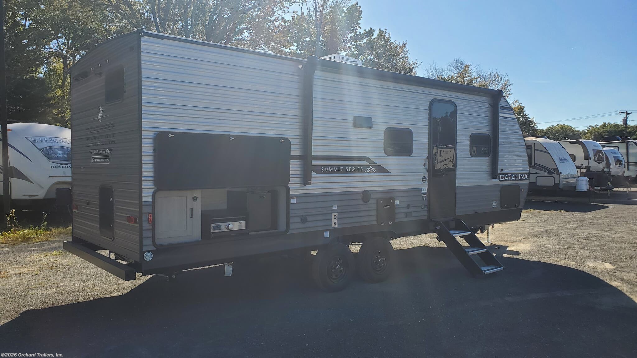2026 Coachmen Catalina Summit Series 8 231BHS - New Travel Trailer For Sale by Orchard Trailers, Inc. in Whately, Massachusetts features Roof Vent, Microwave, Slideout, Ladder, Thermofoil Countertops