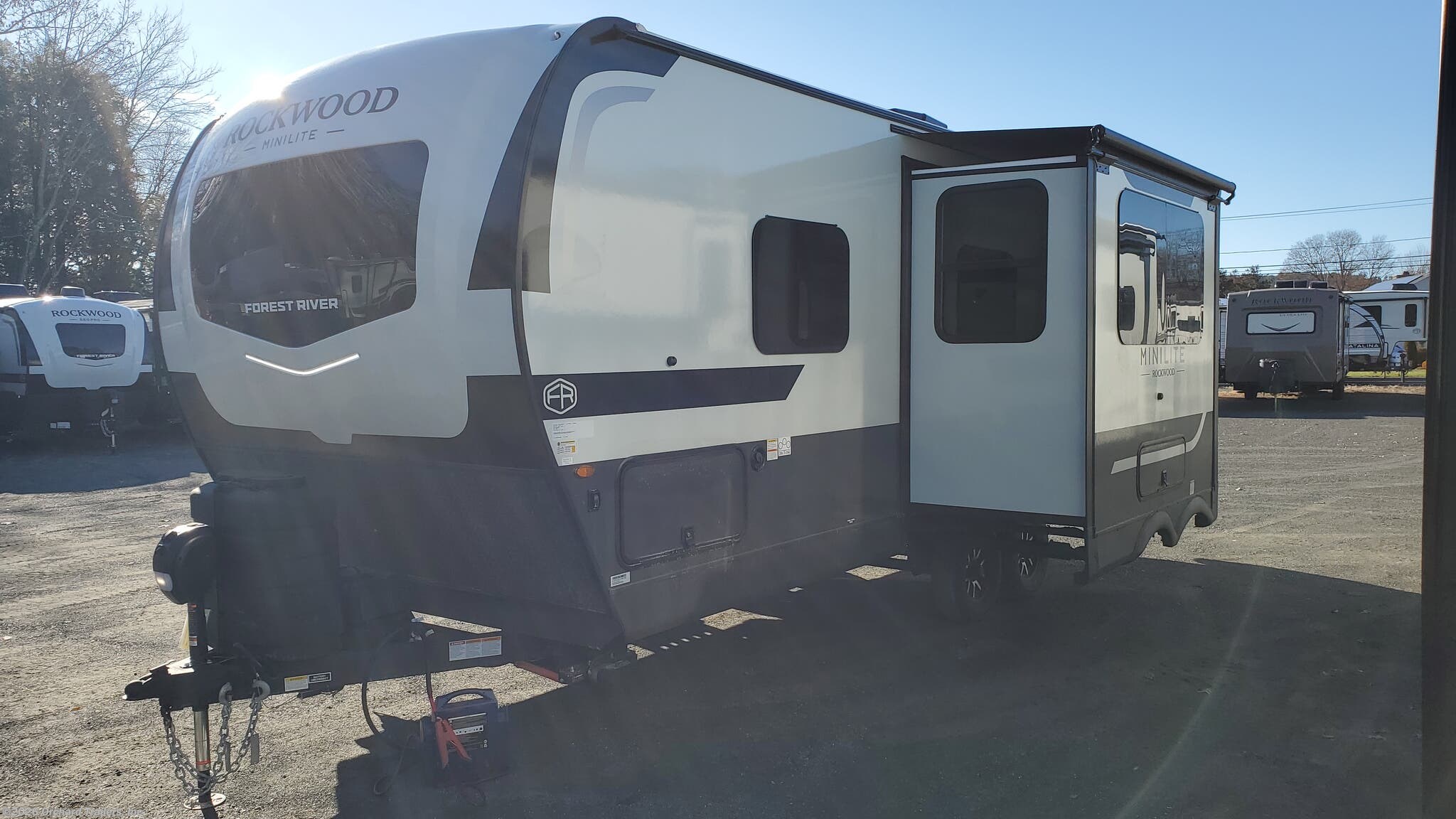 2026 Forest River Rockwood Mini Lite 2520BH - New Travel Trailer For Sale by Orchard Trailers, Inc. in Whately, Massachusetts features Griddle, Ladder, Refrigerator, Hitch, Awning