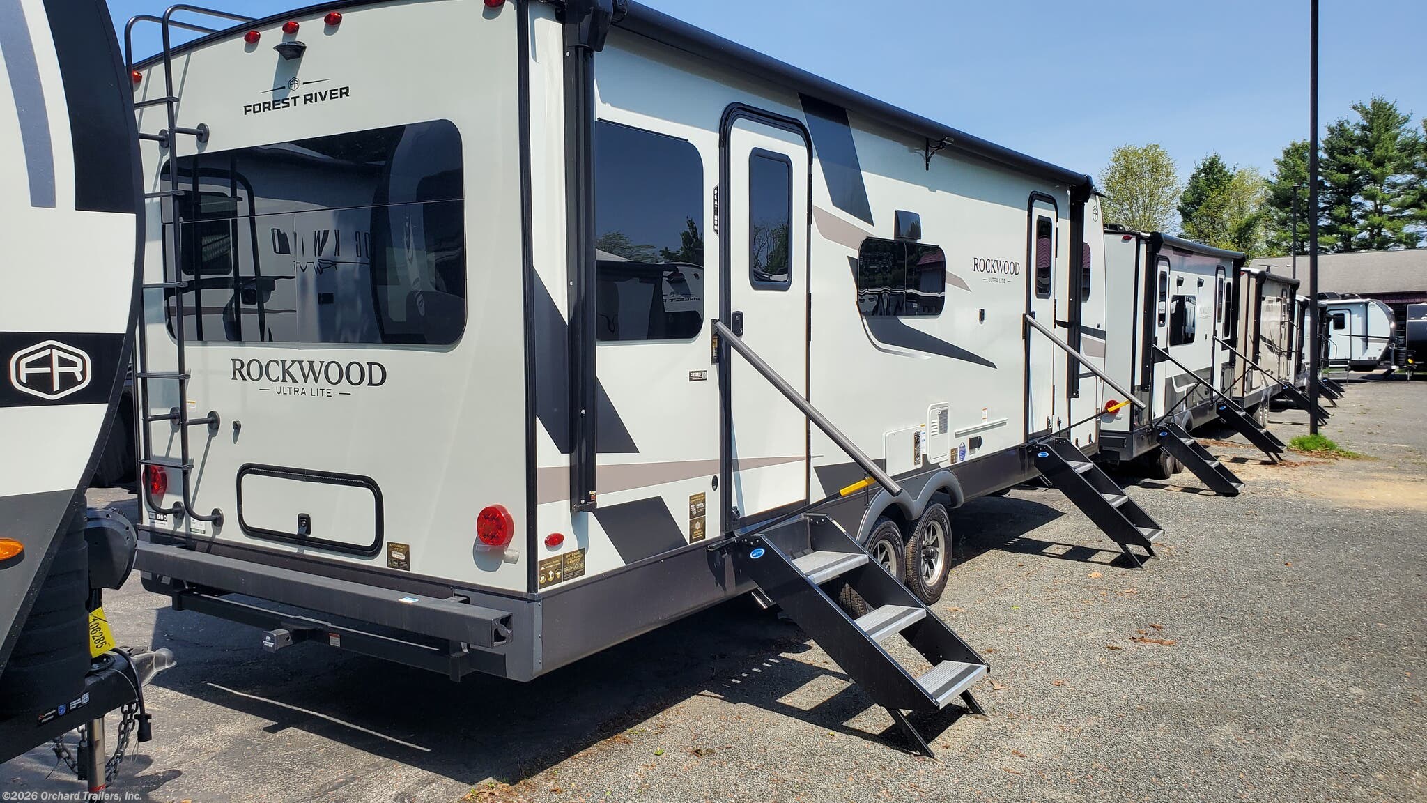 2026 Forest River Rockwood Ultra Lite 2618RD - New Travel Trailer For Sale by Orchard Trailers, Inc. in Whately, Massachusetts features Slideout, Shower, Hitch, Enclosed Underbelly, Fireplace