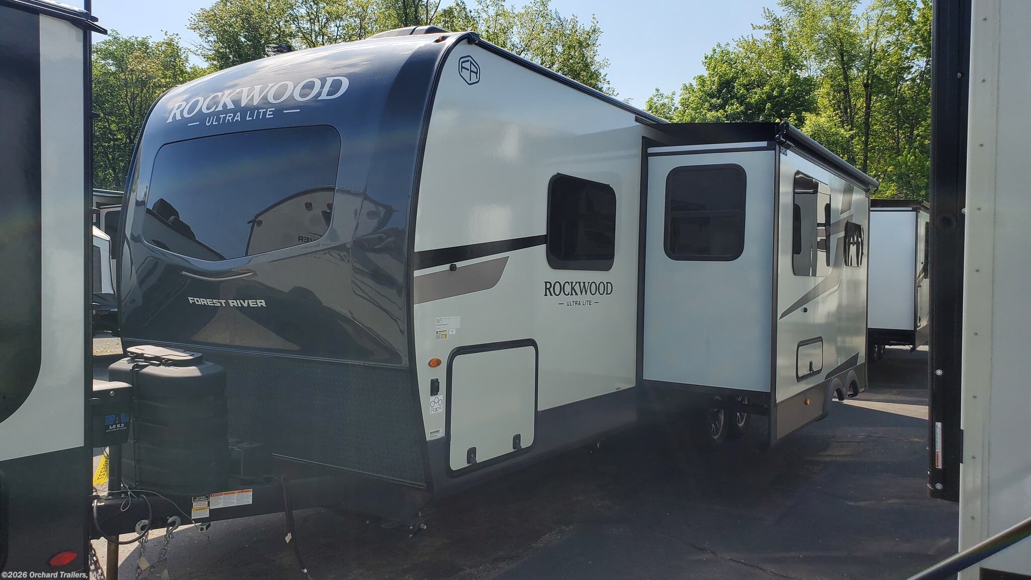 2026 Forest River Rockwood Ultra Lite 2706BH - New Travel Trailer For Sale by Orchard Trailers, Inc. in Whately, Massachusetts features Backup Camera, Water Heater, Ladder, Smart TV, Enclosed Underbelly