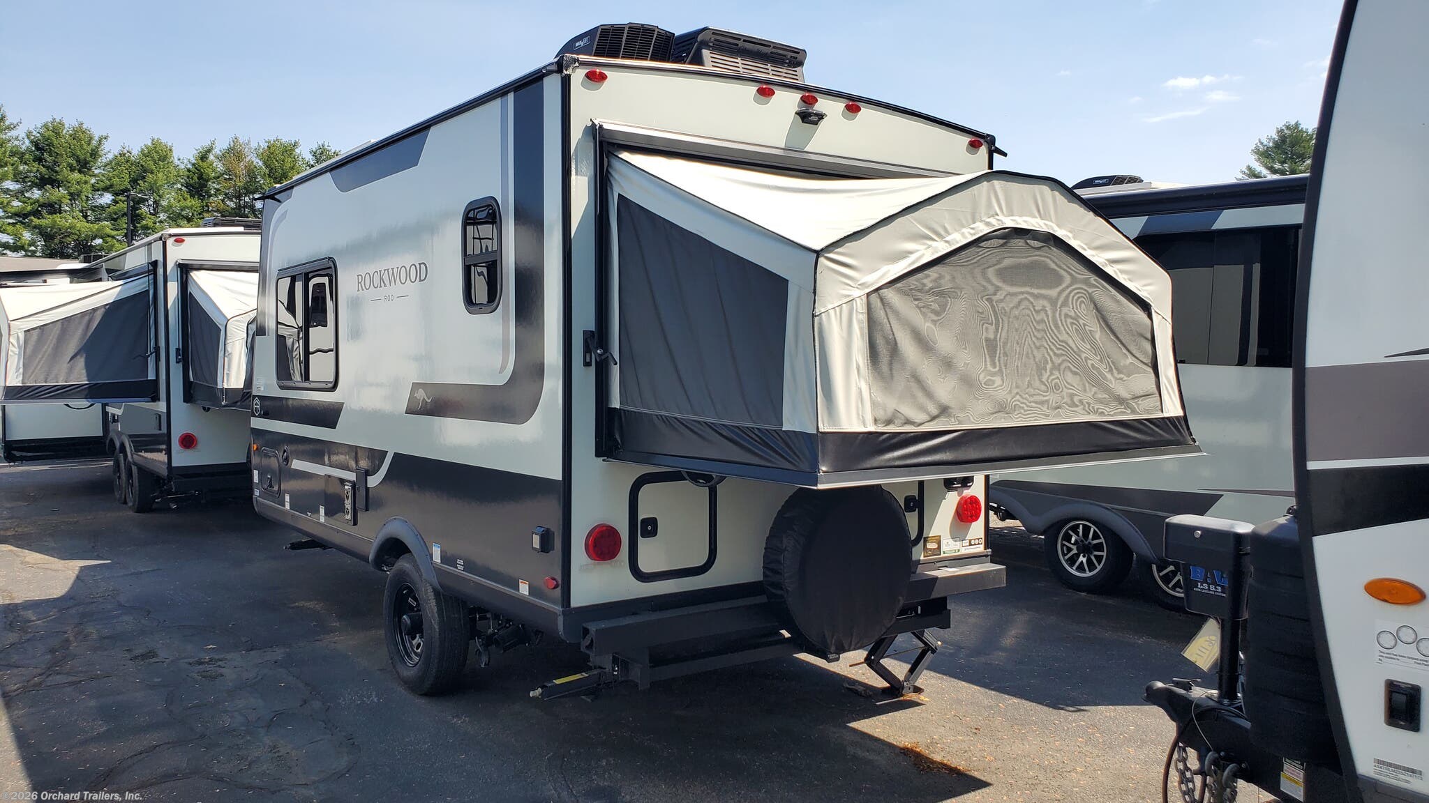 2026 Forest River Rockwood Roo 17E - New Expandable Trailer For Sale by Orchard Trailers, Inc. in Whately, Massachusetts features Power Awning, Water Heater, Solar Prep, Solar Panel, Slam Latch Baggage Doors