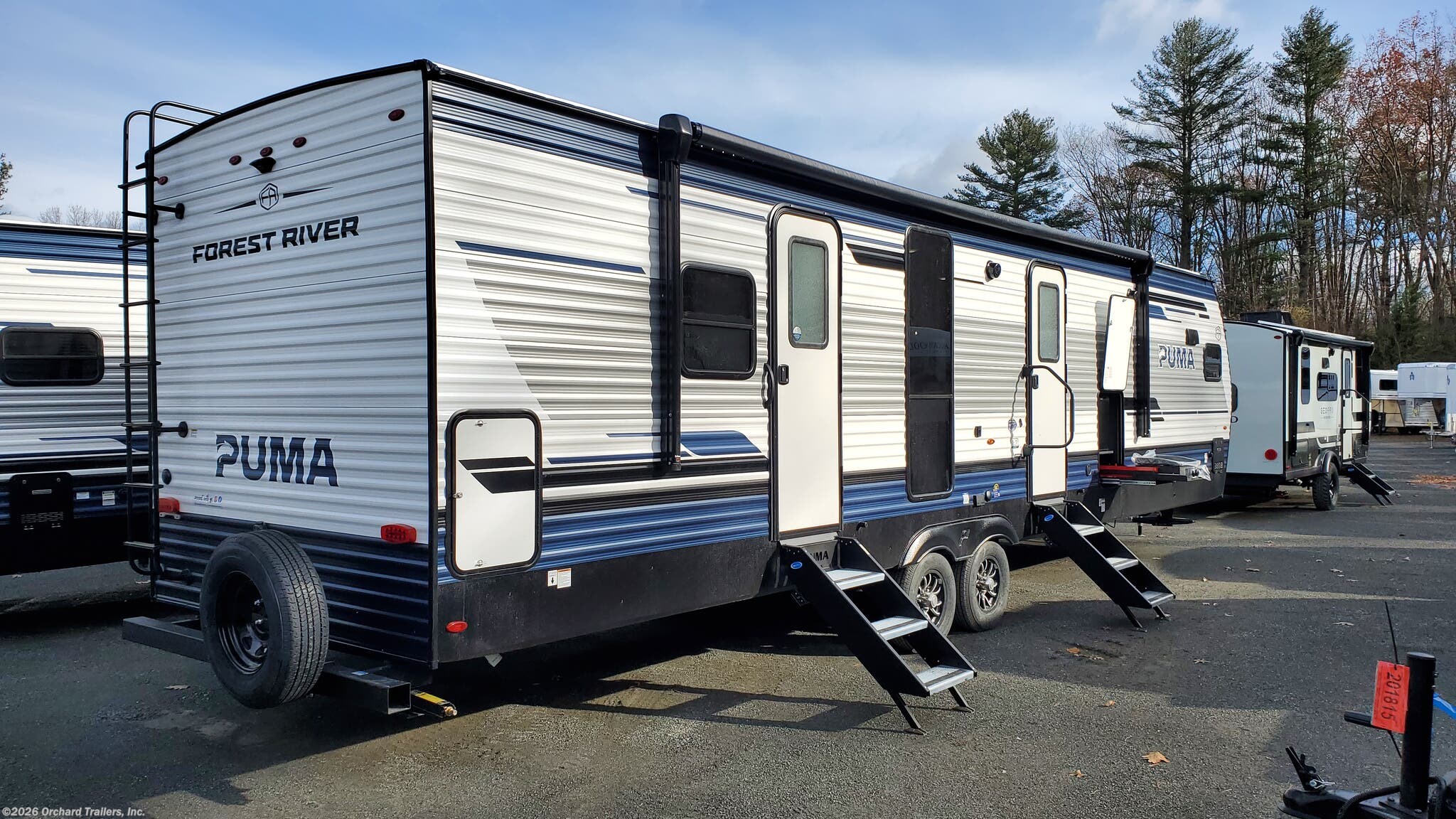 2026 Palomino Puma 31FKRK - New Travel Trailer For Sale by Orchard Trailers, Inc. in Whately, Massachusetts features Shower, Roof Vent, TV, Ladder, 50 Amp Service