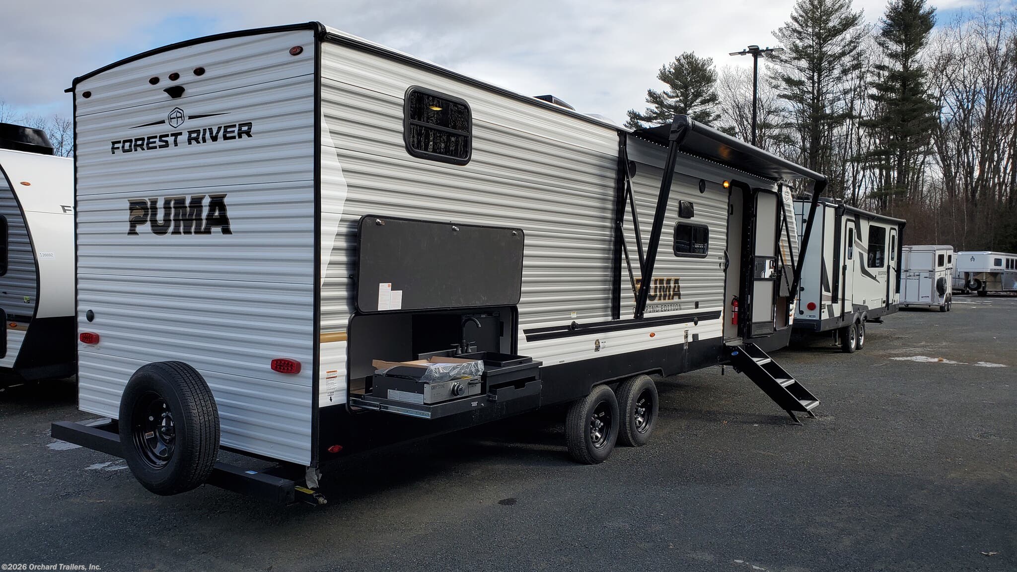 2026 Palomino Puma Camping Edition 304BHCE - New Travel Trailer For Sale by Orchard Trailers, Inc. in Whately, Massachusetts features Thermofoil Countertops, Water Heater, Black Tank Flush, Microwave