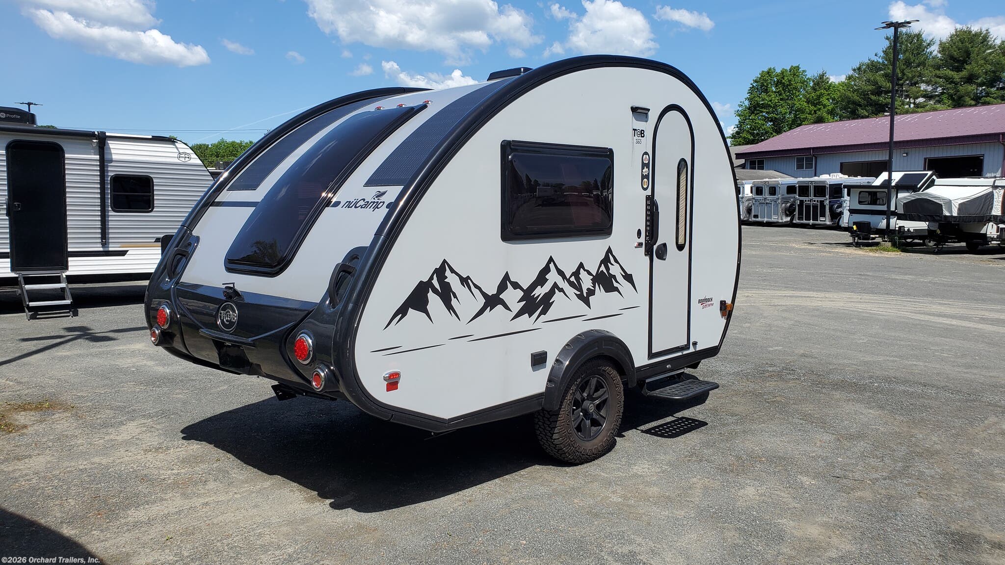 2025 NuCamp TAB 360 Boondock - Used Teardrop Trailer For Sale by Orchard Trailers, Inc. in Whately, Massachusetts features Smart TV, Shower, Converter, Stove, TV