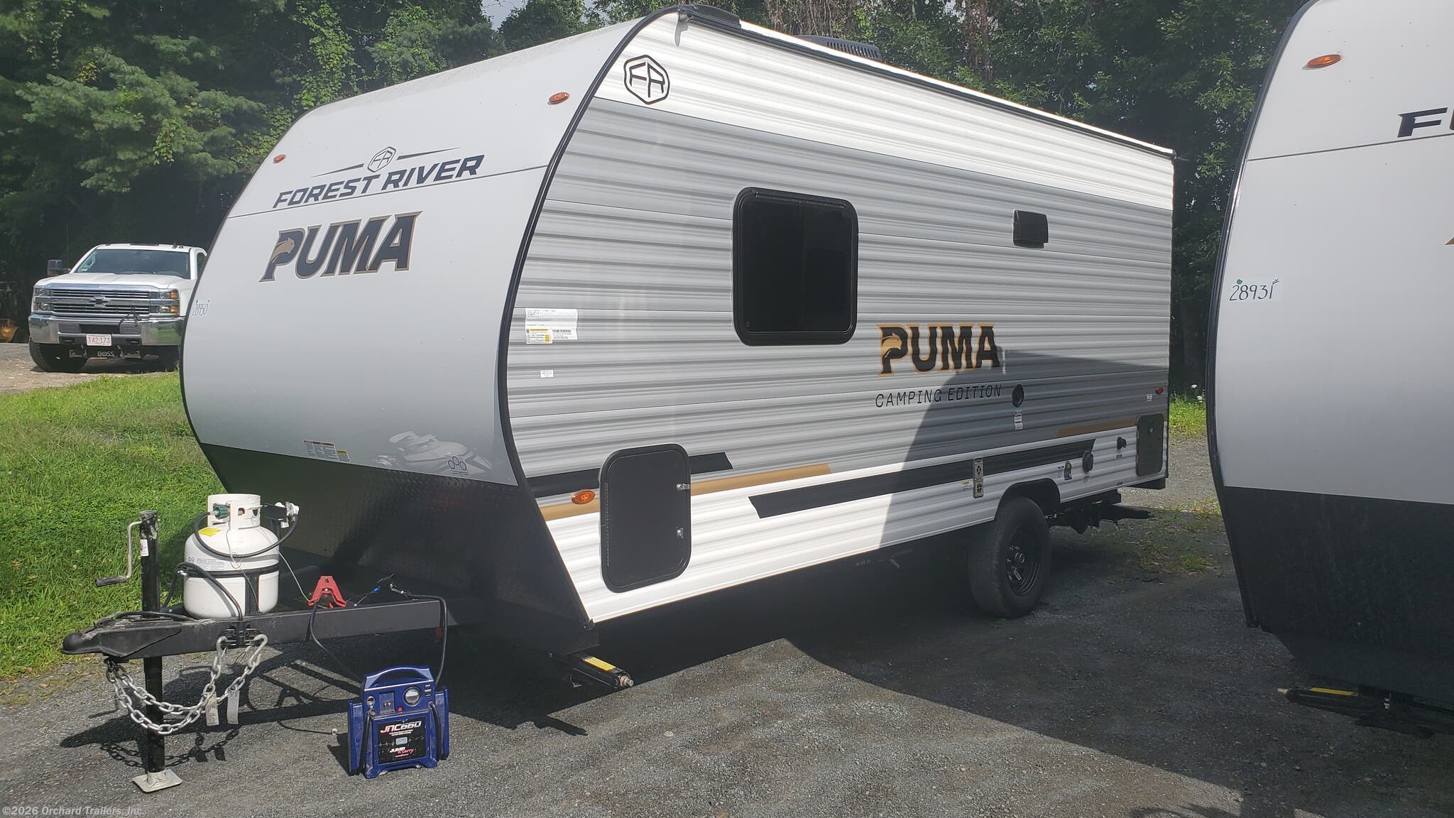 2027 Forest River Puma Camping Edition 16QBCE - New Travel Trailer For Sale by Orchard Trailers, Inc. in Whately, Massachusetts features Heat Pump, Pleated Shades, Thermofoil Countertops, Microwave, Water Heater