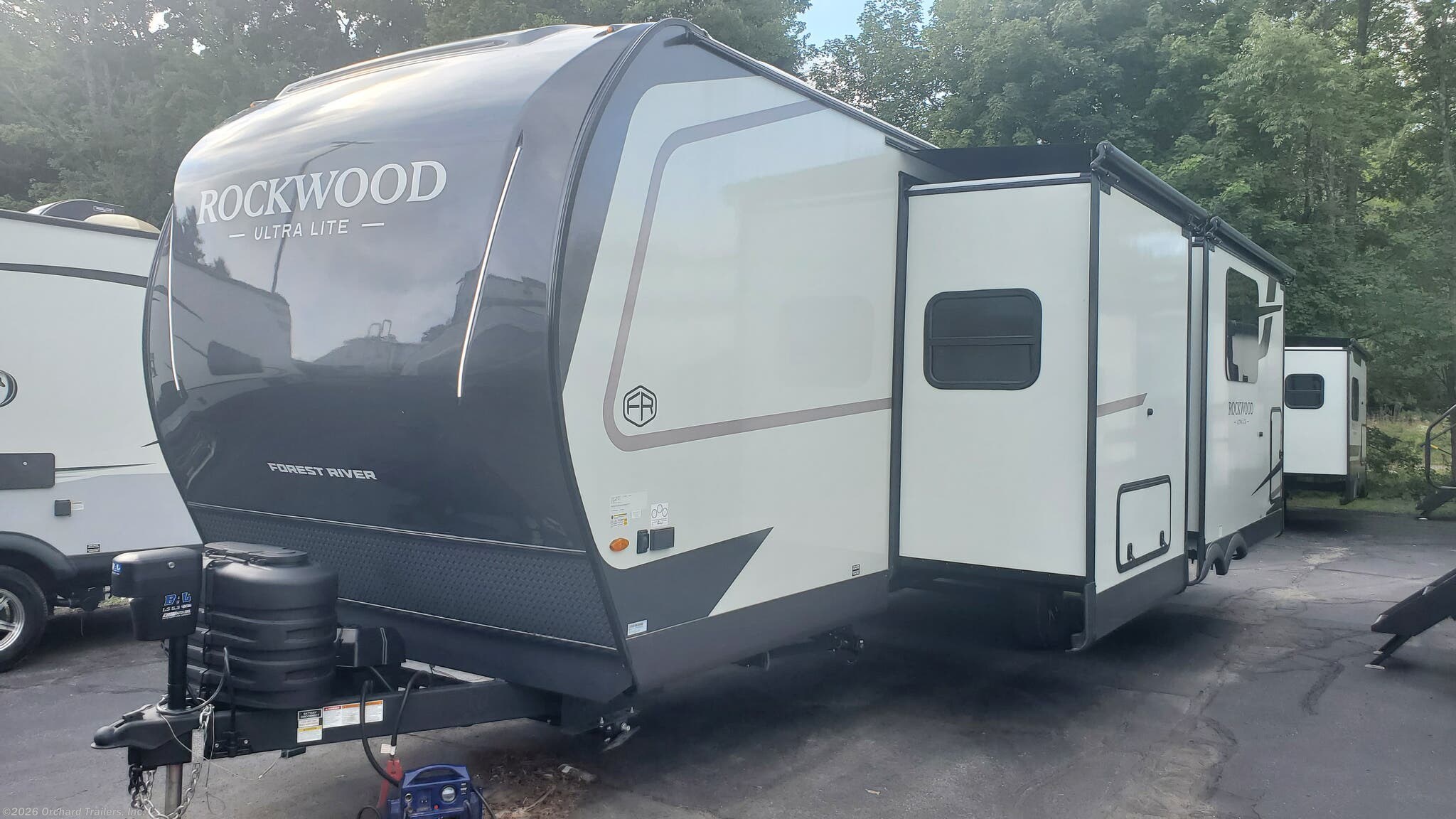 2027 Forest River Rockwood Ultra Lite 2711RK - New Travel Trailer For Sale by Orchard Trailers, Inc. in Whately, Massachusetts features TV, Slideout, Black Tank Flush, Inverter, Smart TV