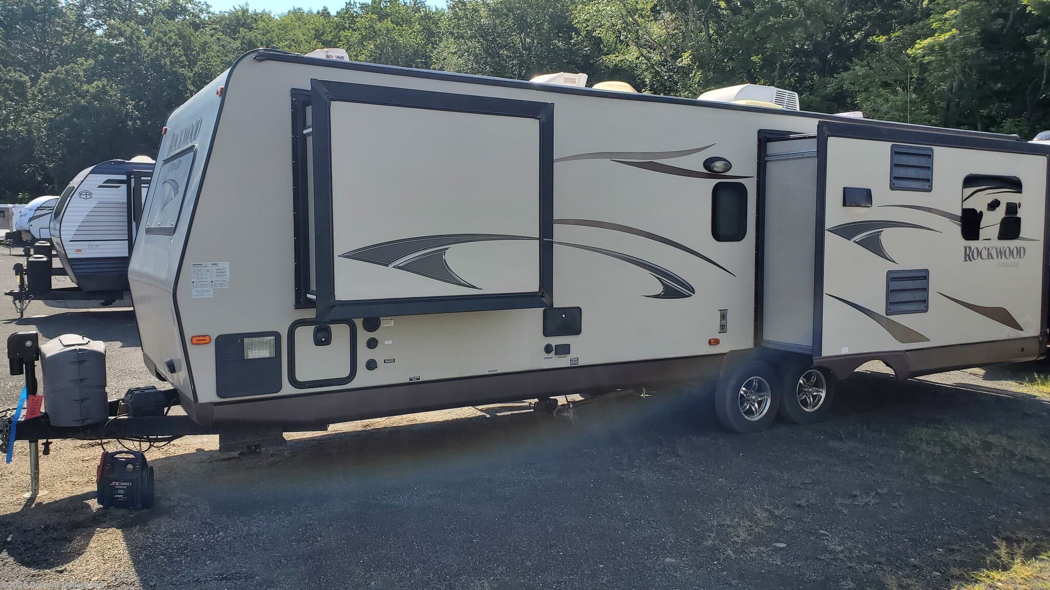 2013 Forest River Rockwood Ultra Lite 2703WS - Used Travel Trailer For Sale by Orchard Trailers, Inc. in Whately, Massachusetts features Toilet, Hide-A-Bed, Screen Door, Microwave, Stove