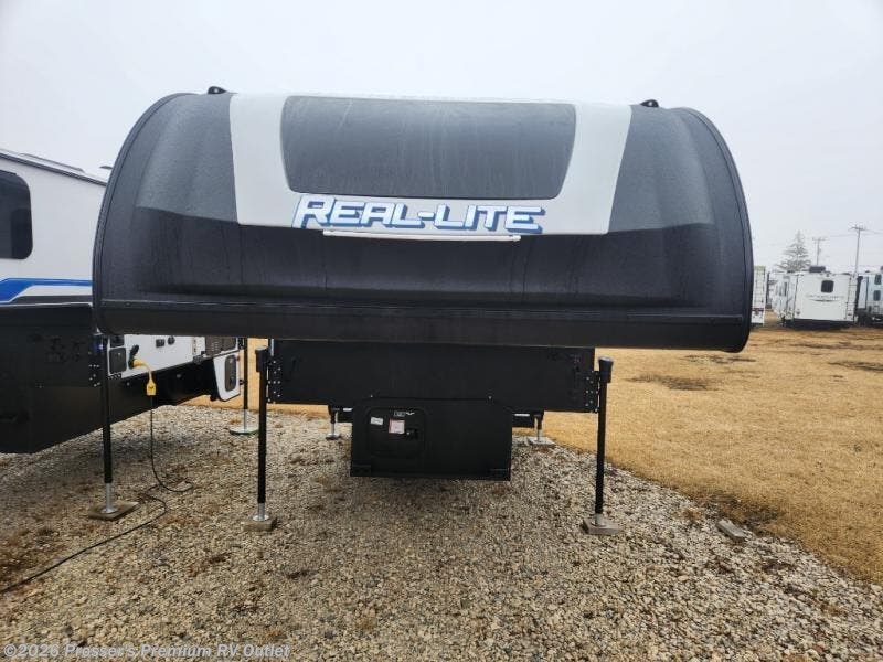 2025 Palomino Real-Lite HS-2110 - New Truck Camper For Sale by Prosser's Premium RV Outlet in Sturtevant, Wisconsin features CO Detector, Queen Bed, Leveling Jacks, Solar Panels, Insulated