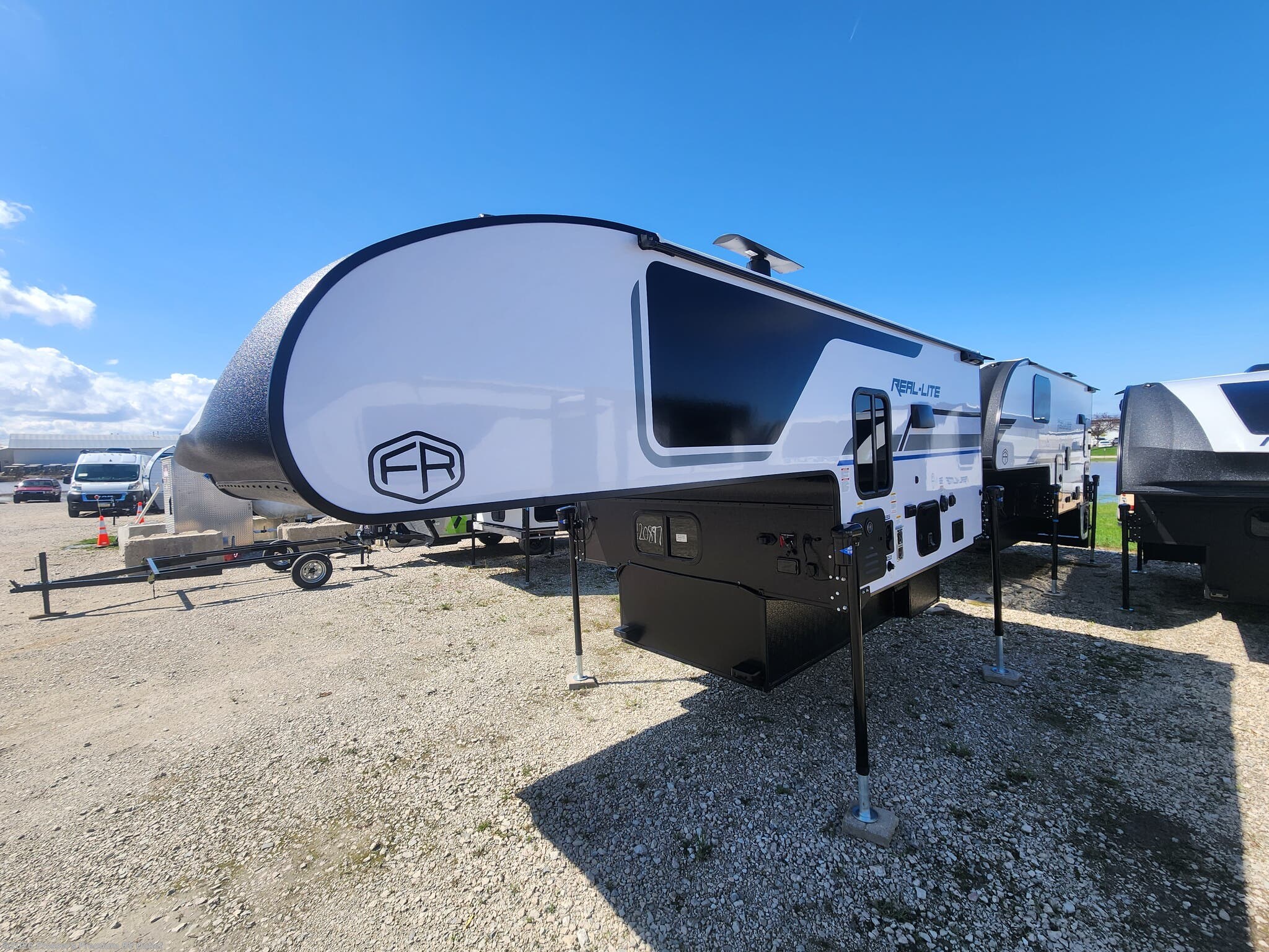 2026 Palomino Real-Lite HS-1803 - New Truck Camper For Sale by Prosser's Premium RV Outlet in Sturtevant, Wisconsin features Shower, Air Conditioning, Refrigerator, Queen Bed, Water Heater