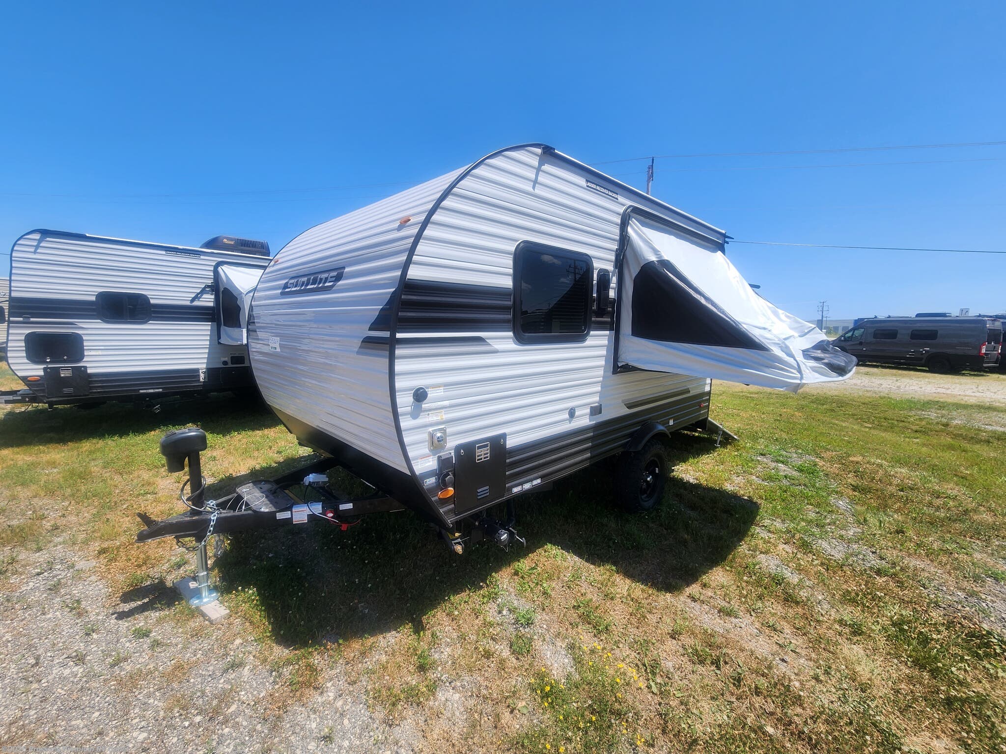 2027 Sunset Park RV Sun Lite 14THX - New Toy Hauler For Sale by Prosser's Premium RV Outlet in Sturtevant, Wisconsin features Smoke Detector, Stove Top Burner, Microwave, Toilet, TV Antenna