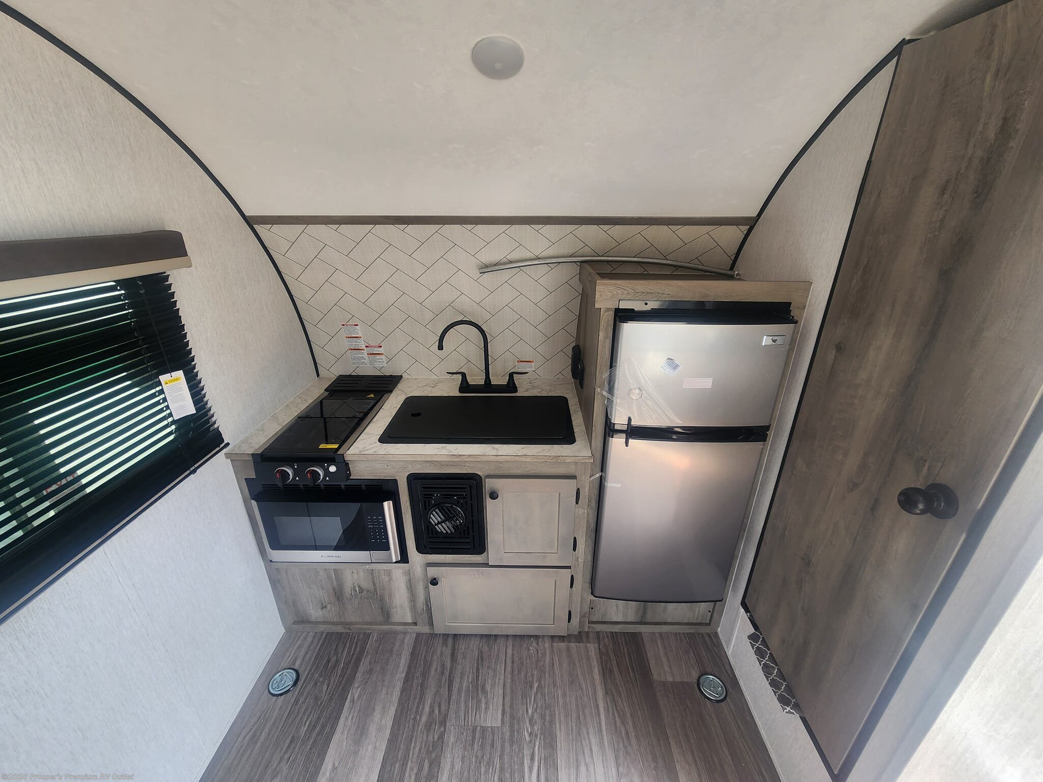 2027 Sunset Park RV Sun Lite 14THX - New Toy Hauler For Sale by Prosser's Premium RV Outlet in Sturtevant, Wisconsin features Stove Top Burner, Power Awning, Stove, Solar Panel, Queen Bed