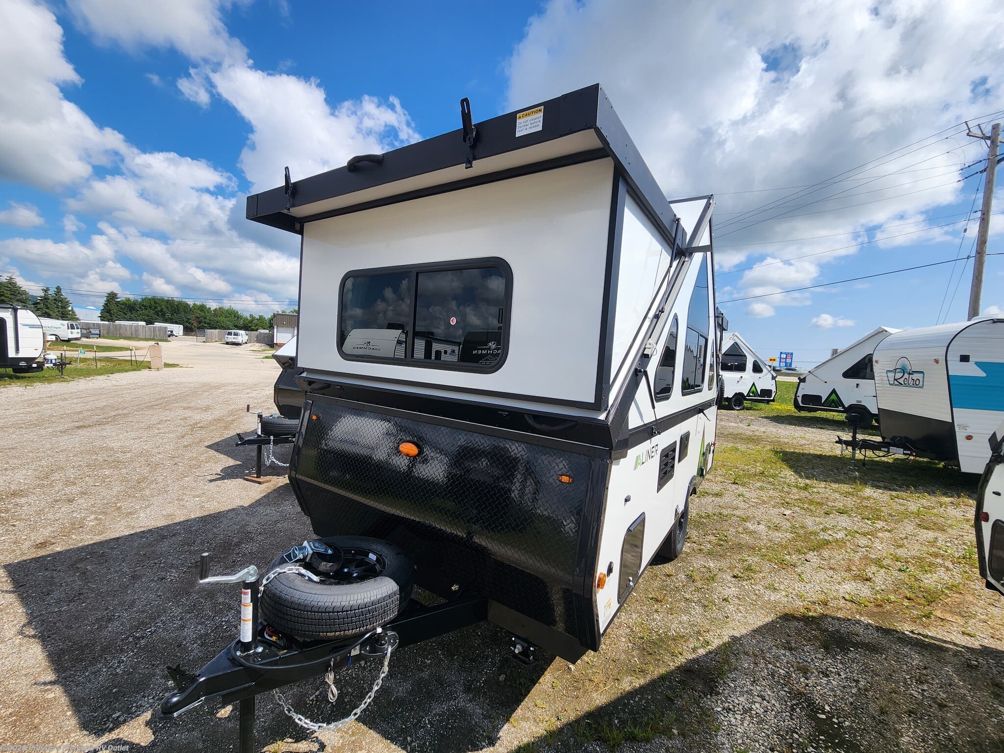 2027 Aliner Expedition REAR SOFA - New Popup For Sale by Prosser's Premium RV Outlet in Sturtevant, Wisconsin features Microwave, External Shower, Air Conditioning, Water Heater, Stove Top Burner