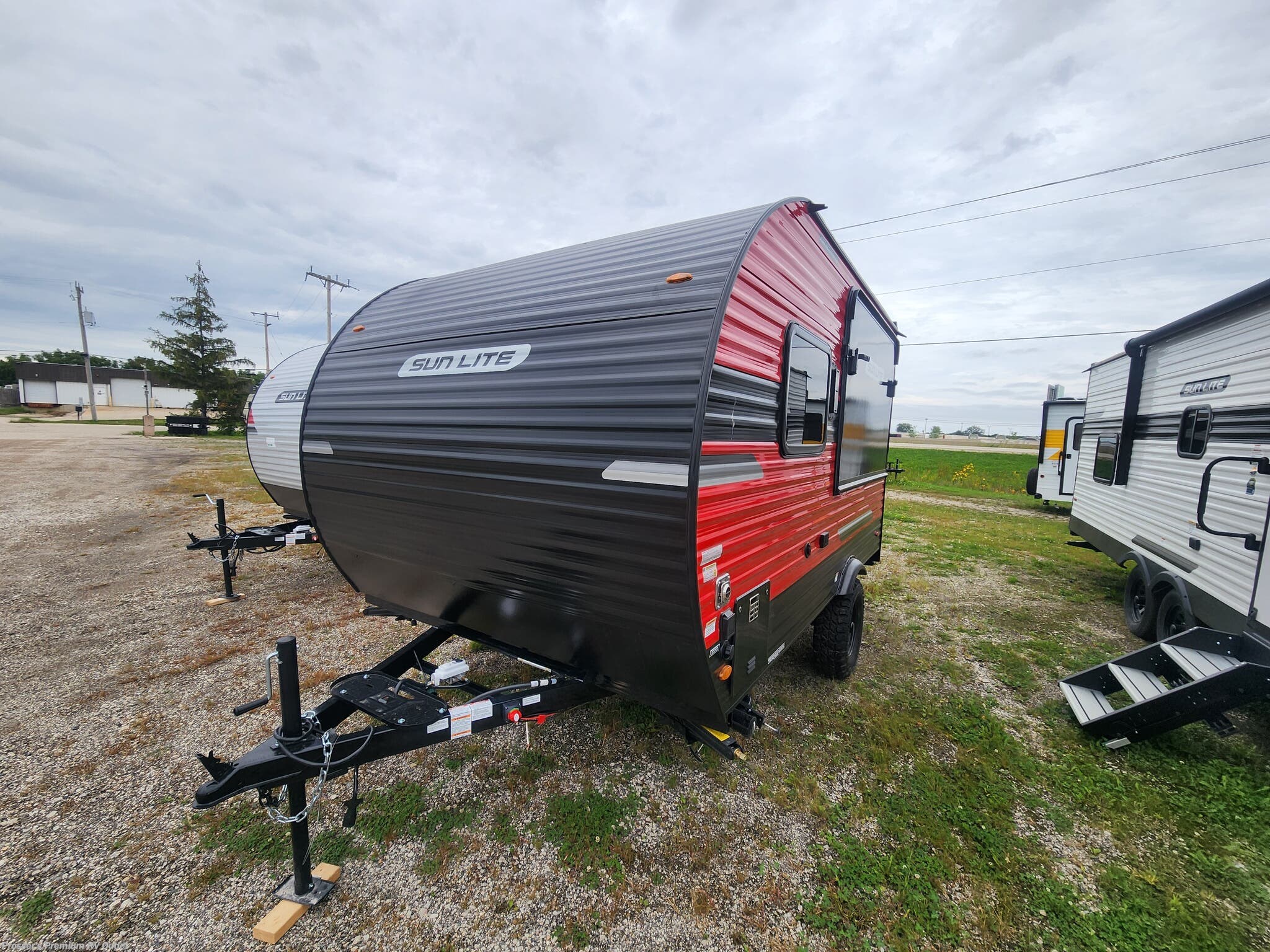 2027 Sun Lite 14THX w/Patio, Rear Awning and Tip-Out by Sunset Park RV from Prosser's Premium RV Outlet in Sturtevant, Wisconsin