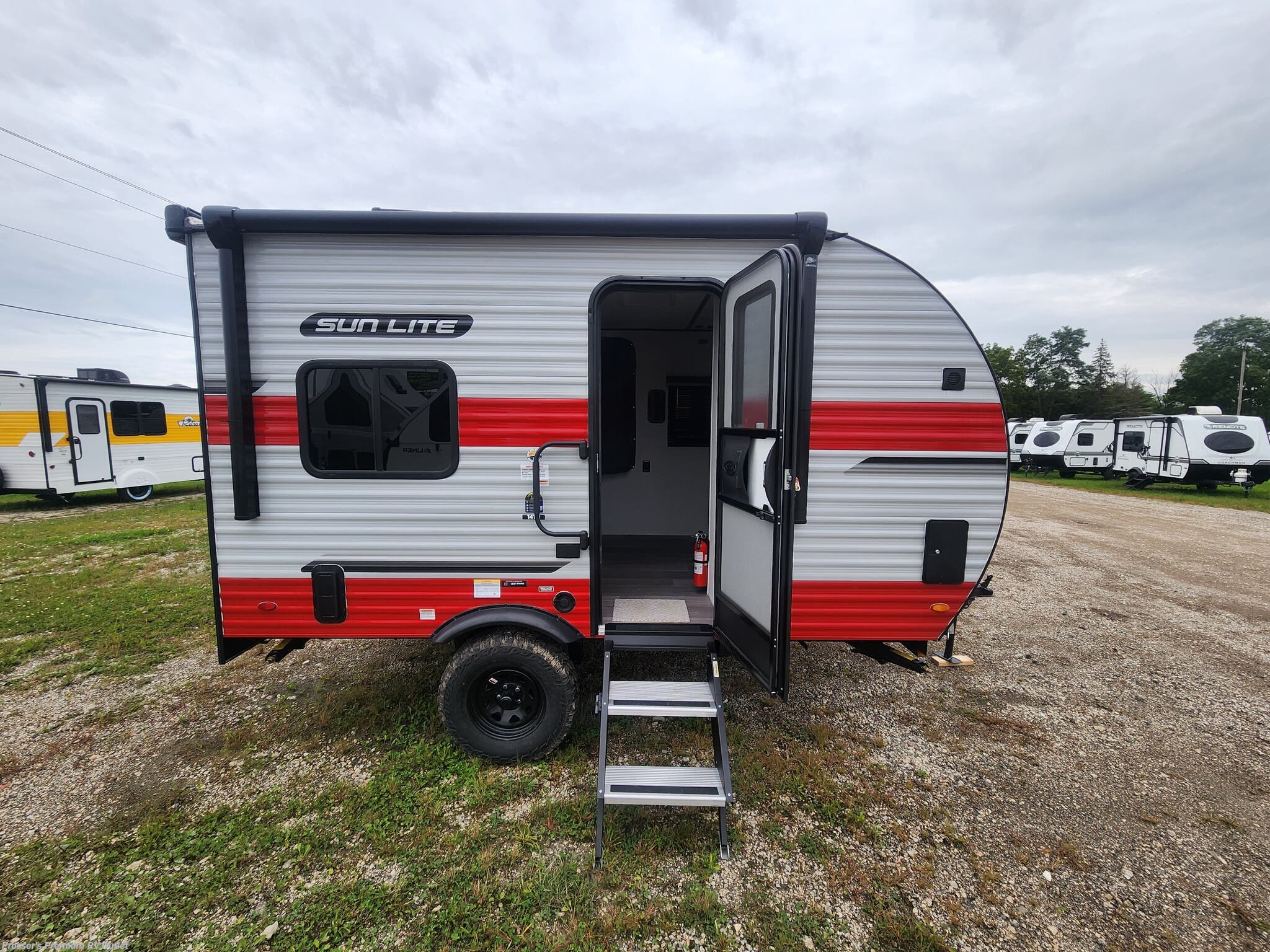 New 2027 Sunset Park RV Sun Lite 14THX w/Patio, Rear Awning and Tip-Out available in Sturtevant, Wisconsin