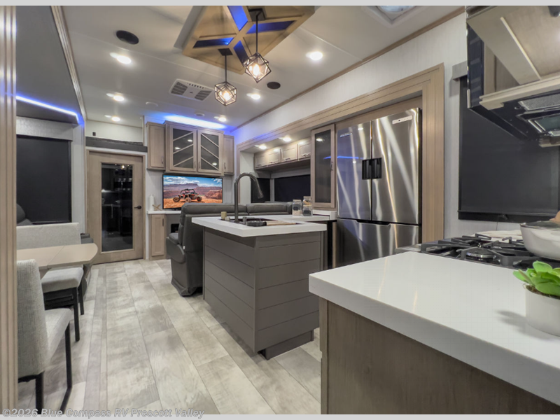 2025 Grand Design Momentum M-Class 395MS - New Toy Hauler For Sale by Blue Compass RV Prescott Valley in Prescott Valley, Arizona features Slideout