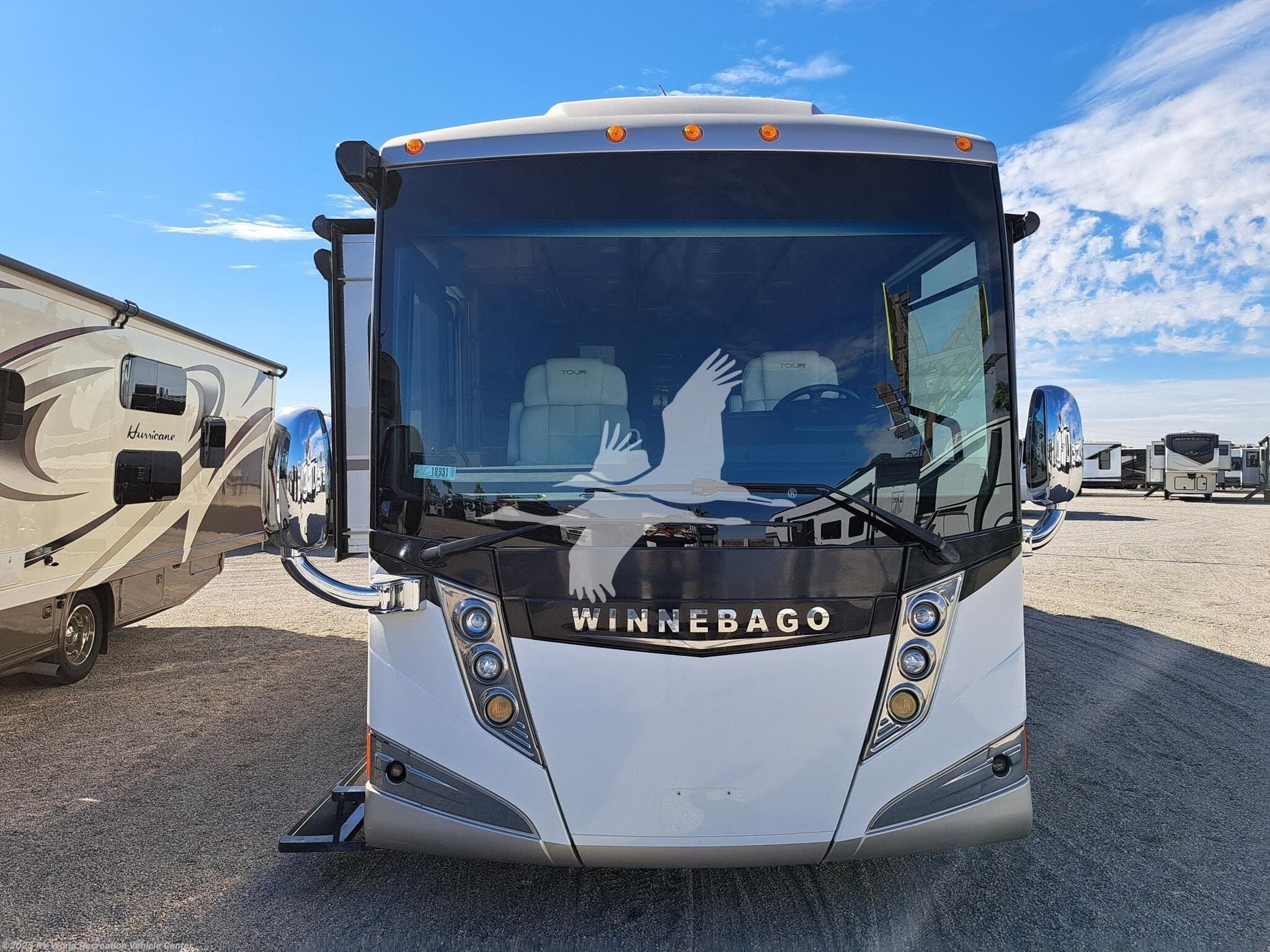 2015 Winnebago Tour 42QD - Used Class A For Sale by RV World Recreation Vehicle Center in Yuma, Arizona features Air Conditioning, Fireplace