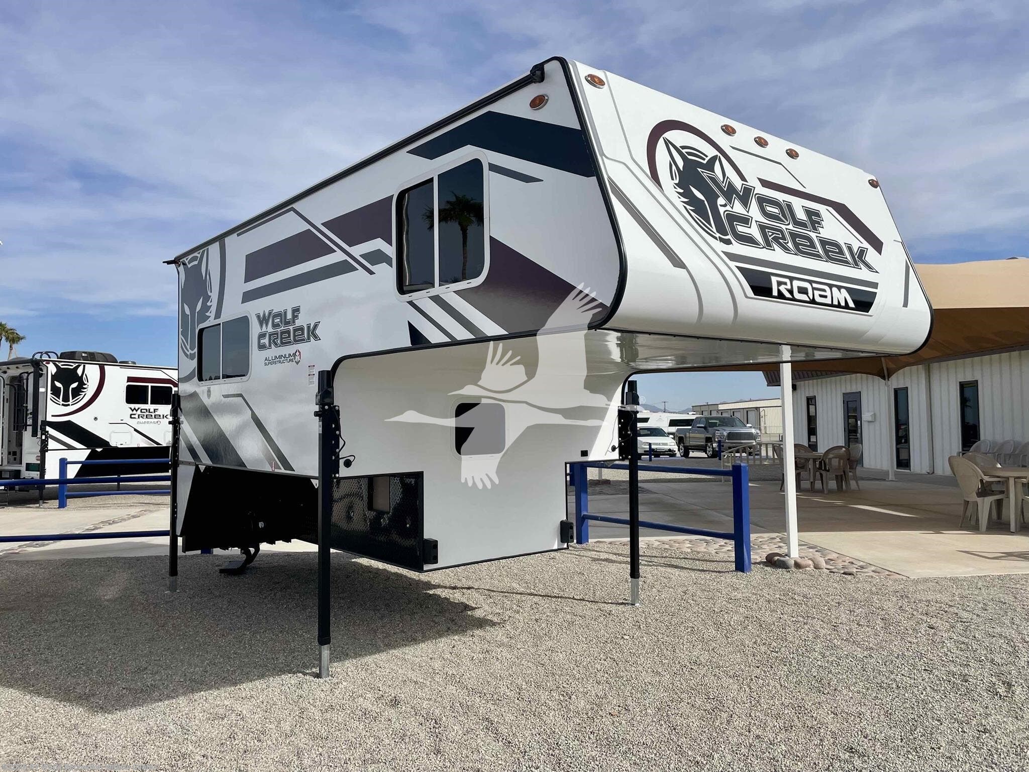 2025 Northwood Wolf Creek 850 - New Truck Camper For Sale by RV World Recreation Vehicle Center in Yuma, Arizona features Leveling Jacks, Air Conditioning