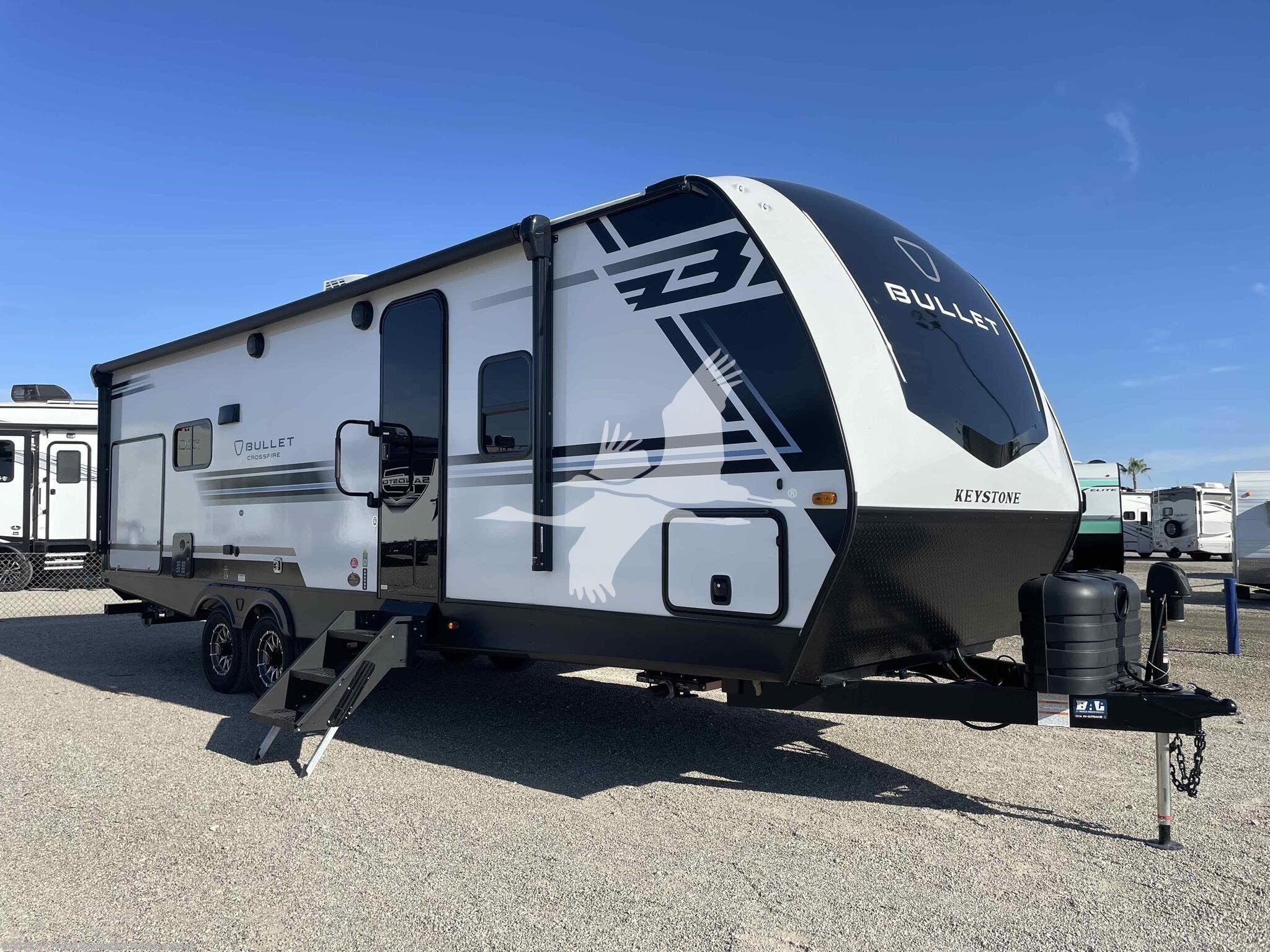2026 Keystone Bullet Crossfire 260RBS - New Travel Trailer For Sale by RV World Recreation Vehicle Center in Yuma, Arizona features Air Conditioning, Fireplace