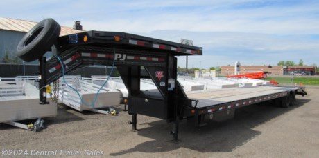 &lt;p&gt;PJ LD 40ft Low-Pro Flatdeck gooseneck trailer, 12,000# electric/hyd disc/spring axles, 102&quot; wide deck, 35ft deck + 5ft dovetail with 2 flip-over monster ramps, primer + black powder coat, upgraded 12&quot; o/c crossmembers, rough oak floor, solar battery charger, under frame tie down flat, 4&quot; ratchets every 4ft w/slide track, removable deck on the neck, 72&quot;x14&quot; side-mount toolbox, monster steps on both sides, LED lights, stake pockets, spare tire and mount.&lt;/p&gt;