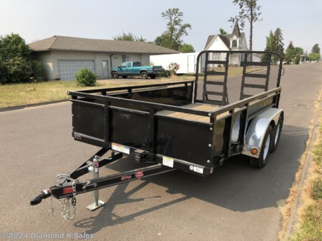 &lt;ul&gt;
&lt;li&gt;2024 P J Trailer UJ12-7K 72&quot; X 12&#39; Landscape Utility Trailer - (7000 G.V.W.R)&lt;/li&gt;
&lt;li&gt;2 3500 lb axles(1 Brake axle) - 205/75/R 15 radial tires on&amp;nbsp; black mod wheels - removable aluminum fenders - removable 22&quot; solid metal sides with 2&quot; X 2&quot; square tube top - 2&quot; bull dog coupler - 5000 lb swing down jack - LED lights - 4&quot; channel frame and wrap tongue.&lt;/li&gt;
&lt;li&gt;4&#39; Gate Ramp.(4&#39; HD Gate Ramp SHOWN IN PICTURES IS NOT INCLUDED)&lt;/li&gt;
&lt;li&gt;Spare Tire &amp;amp; Mount&lt;/li&gt;
&lt;li&gt;Black Powder Coat.&lt;/li&gt;
&lt;li&gt;Serial # 2610514&lt;/li&gt;
&lt;li&gt;This trailer comes with black mod wheels.&lt;/li&gt;
&lt;li style=&quot;box-sizing: inherit;&quot;&gt;PJ HAS PUT ALL HIGH SIDE TRAILERS ON HOLD WITH NO RESTART TIME.&amp;nbsp;&lt;/li&gt;
&lt;li style=&quot;box-sizing: inherit;&quot;&gt;YOU CAN CHOOSE FROM OUR DIAMOND K, SUMMIT AND GREAT NORTHERN OPTIONS OR WAIT TILL THEY RESUME.&lt;/li&gt;
&lt;/ul&gt;
&lt;p&gt;&amp;nbsp;&lt;/p&gt;
&lt;p&gt;&amp;nbsp;&lt;/p&gt;
&lt;p&gt;&amp;nbsp;&lt;/p&gt;