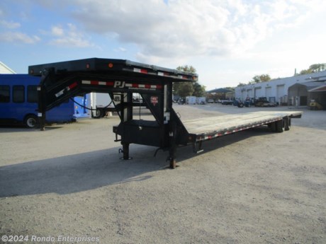Stock #18473 Used 2021 PJ Trailer 102x44&#39; Gooseneck, Model: LDR44A2BSSKTM-DON1-JA01, 25000 lbs GVW; Number of axle(s): 2; Per axle capacity: 10000 lbs; Steel construction, Gooseneck hitch, A-MAY-zing Spring Sale!&amp;nbsp;April showers have come and gone. And now May is blooming with DEALS! While supplies last - Don&amp;apos;t delay! USED Straight deck, Slide in ramps (1 ramp bent), Deck on the neck, Front Toolbox (lid shocks don&#39;t work), Torque tube, (2) HD 25k Jost Jacks, LEDs, (2) Dexter 10k axles with 6 inch spread/longer equalizer (axles moved 12 inches forward) with electric brakes (condition: fair). Color: Black. Estimated empty weight 9870#. *Spare tire is NOT included. Sold separately. IL Rebuilt title - see Rebuilt disclosurer.  Estimated payload capacity: 15130 lbs, Vin #4P5LD4422M3054088.  SOLD AS IS, NO WARRANTY.  The Buyer will pay all costs for any repairs. The Dealer assumes no responsibility for any repairs regardless of any oral statements about the trailer. Located in Sycamore, IL 60178. All prices advertised do NOT include doc fee, taxes, title, and plate fees.   Go to www.rondotrailer.com for more information and to see our HUGE selection of inventory.  We&#39;re here to help because we&#39;re always behind you!     Tags:Gooseneck Flatbed     Other Flatbed Gooseneck Trailers Flatbed Gooseneck Trailers Flatbed Trailer Deckover.