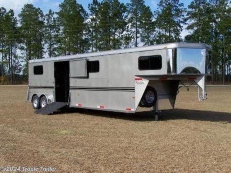&#39;Rent-to-Own&#39; &#39;No Credit Check&#39;&lt;br&gt; &lt;br&gt; &#39;Rent-to-Own&#39; &#39;No Credit Check&#39; &lt;br&gt;ALL PRICES SHOWN ARE FOR FACTORY PICK UP&lt;br&gt;&lt;br&gt;4 Horse Gooseneck Head to Head&lt;br&gt;&lt;br&gt;*Shown with optional stainless pkg. 29&#39; long x 6&#39; wide x 7&#39; high – 5&#39; dressing room with RV door – Right side ramp with top door – 10&#39; stalls – 4&#39; center area – Full rear doors with bus windows&lt;br&gt;Features:&lt;br&gt;&amp;#8226;29&#39; long x 6&#39; wide x 7&#39; high&lt;br&gt;&amp;#8226;A-60 Auto Grade Galvannealed sheets&lt;br&gt;&amp;#8226;Diamond gravel guard under nose &amp;amp; on fenders&lt;br&gt;&amp;#8226;5&#39; dressing room with RV vent &amp;amp; RV door&lt;br&gt;&amp;#8226;Round, Square or V-nose with 18 x 44 bus windows&lt;br&gt;&amp;#8226;Full carpet in D/R&lt;br&gt;&amp;#8226;Shelf with clothes bar in D/R&lt;br&gt;&amp;#8226;10&#39; horse stalls – 4&#39; head area&lt;br&gt;&amp;#8226;Right side ramp with top doors&lt;br&gt;&amp;#8226;Left side escape door&lt;br&gt;&amp;#8226;4 breast bars with pads&lt;br&gt;&amp;#8226;Padded butt bars for rear horses&lt;br&gt;&amp;#8226;Horse dividers with head dividers&lt;br&gt;&amp;#8226;18 x 44 windows in horse area (4)&lt;br&gt;&amp;#8226;Stall mats on floor – full pads&lt;br&gt;&amp;#8226;Oval tail lights&lt;br&gt;&amp;#8226;Steel lined walls&lt;br&gt;&amp;#8226;Two dome lights in D/R &amp;amp; horse area&lt;br&gt;&amp;#8226;Full rear doors with 14 x 21 bus windows&lt;br&gt;&amp;#8226;Cam locks on rear doors&lt;br&gt;&amp;#8226;Top panel with 2 tail lights&lt;br&gt;&amp;#8226;7.0k lb cap RR brake axles&lt;br&gt;&amp;#8226;Breakaway kit and safety chains&lt;br&gt;&amp;#8226;LT235 85R16 10 ply tires&lt;br&gt;&amp;#8226;Spare tire on side, 5 Year Rust Warranty&lt;br&gt;&lt;br&gt;BEST GALVANNEAL TRAILER ON THE MARKET FOR THE MONEY!!!&lt;br&gt;&lt;br&gt;*FACTORY PICK UP PRICE IN GA.*&lt;br&gt;&lt;br&gt;GREAT PRICES ON ALL OPTIONS&lt;br&gt;&lt;br&gt;Options Available:&lt;br&gt;&amp;#8226;Stainless pkg-nose, gravel guards &amp;amp; wheel covers&lt;br&gt;&amp;#8226;6&amp;#8217;8 wide&lt;br&gt;&amp;#8226;Extra length&lt;br&gt;&amp;#8226;Rubber rear bumper&lt;br&gt;&amp;#8226;AC prep pkg&lt;br&gt;&amp;#8226;7-1/2&#39; high http://www.tropictrailer.com/--xInventoryDetail?id=8311281