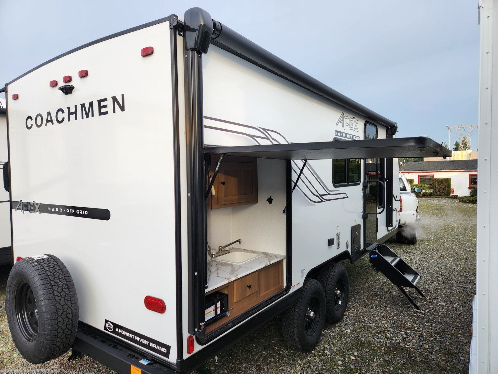 2026 Coachmen Apex Nano 203RBK - New Travel Trailer For Sale by South Hill RV Sales in Puyallup, Washington features Medicine Cabinet, Power Roof Vent, Griddle, Detachable, Black Tank Flush